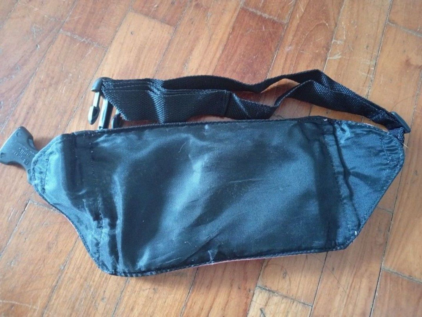 Pouch (Category: Purses & Pouches) located in Singapore. Submitted by crisis7979 (Listing ID 1461811413, Image 4). Description: - Pink pouch - Multiple zippered compartments - Front pocket - Adjustable strap.