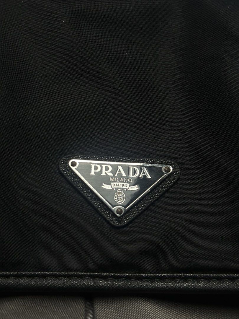 PRADA (Category: Luxury Bags & Wallets) located in Orani. Submitted by ajgav69 (Listing ID 1461909581, Image 3). Description: Prada Messenger bag brown black gray Ykk zip With white tag Excllent condition.