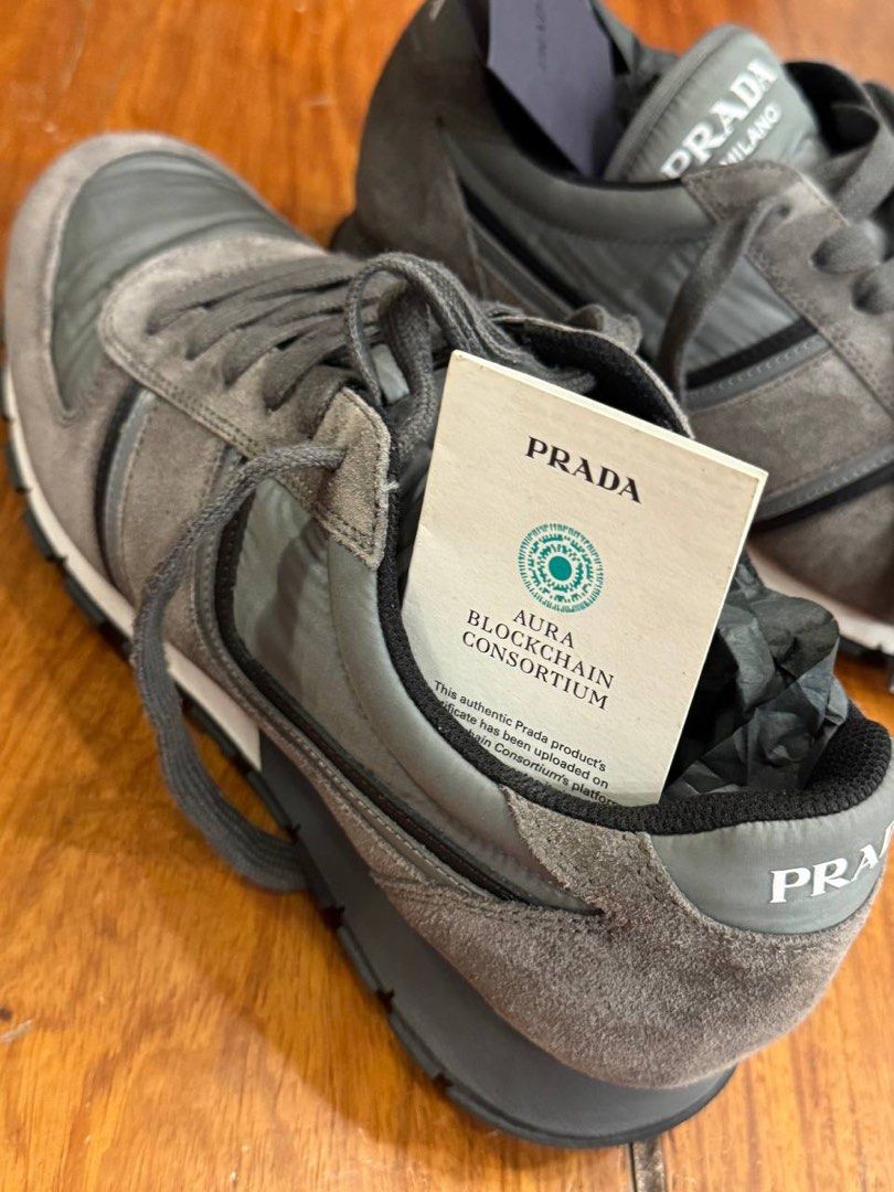 Prada Grey Suede Sneakers (Category: Sneakers & Footwear) located in Pasig City. Submitted by suameiko (Listing ID 1461974439, Image 3). Description: - Grey Prada sneakers - Suede material - Includes authenticity card and original dustbag - Negotiable.