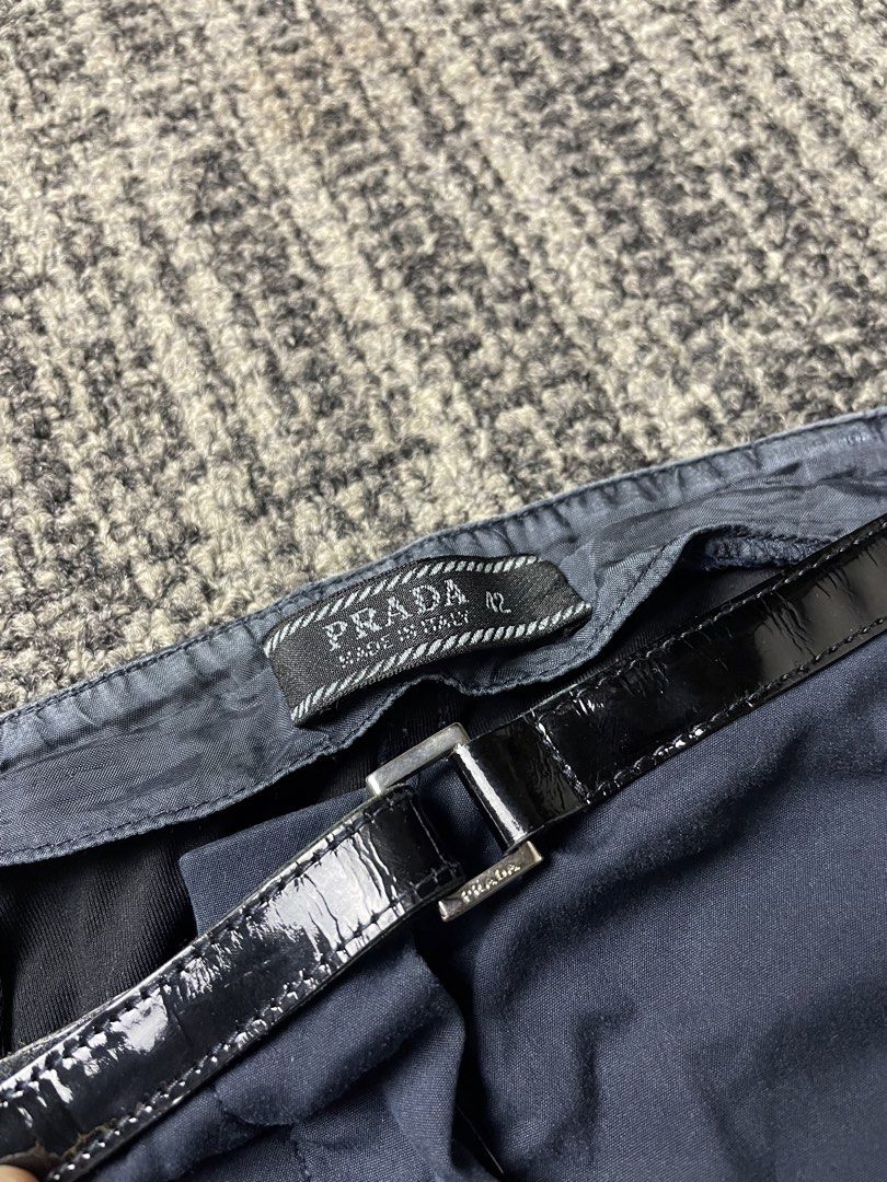 Prada Nylon Trouser With Patent Leather Strap (Category: Other Bottoms) located in Manila. Submitted by rdtp2 (Listing ID 1461966123, Image 3). Description: size 42 waistline 30 length 32 hem 8 flaw you can see to the last pic good condition 9/10.