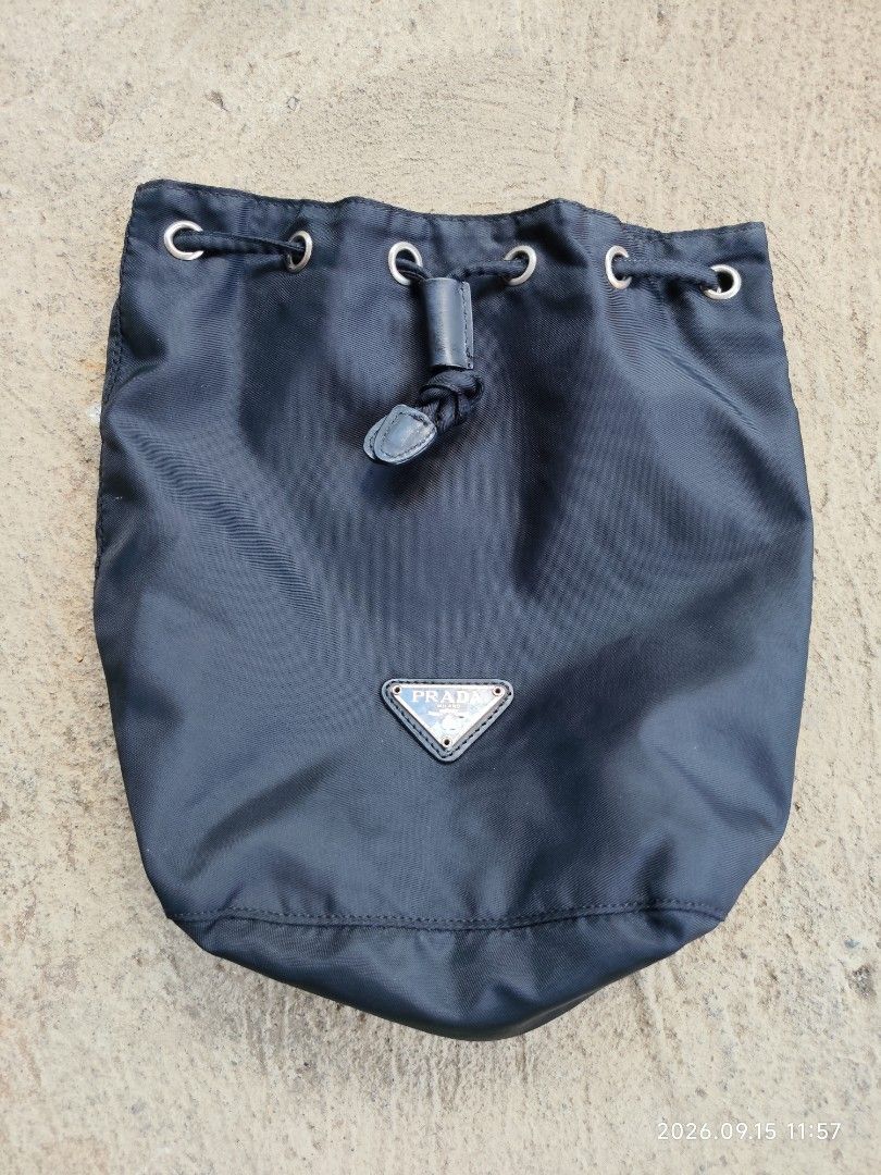 Prada Pouch (Category: Luxury Bags & Wallets) located in La Union. Submitted by lumang__gamit00 (Listing ID 1461828167, Image 1). Description: Prada Black Nylon Drawstring Pouch excellent Condition.