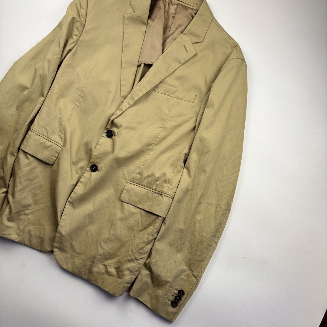 Prada Sports 2B Sport Jacket (Category: Coats, Jackets and Outerwear) located in Makati City. Submitted by ragrepository (Listing ID 1461946481, Image 2). Description: Prada Sports 2B Sport Jacket Tagged as 48 Length- 27.5” Pit to pit- 20.5” Sleeves- 24.5” Shoulder-17.5” Condition- 9/10 Flaw- Stains.