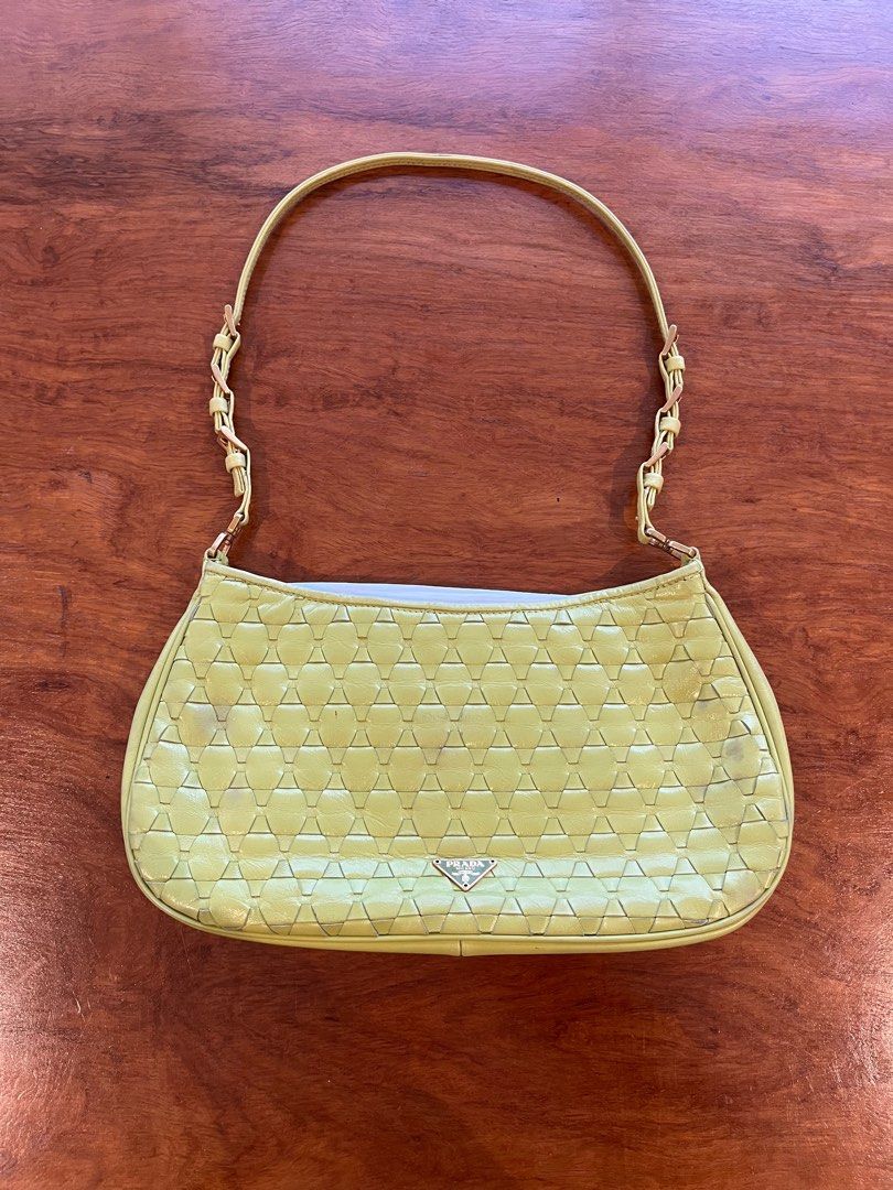 Prada Woven Leather Shoulder Bag (Category: Luxury Bags & Wallets) located in Makati City. Submitted by apwellloved (Listing ID 1461802991, Image 1). Description: - Authentic Vintage Prada olive woven/mosaic leather shoulder bag - Features the iconic Prada triangle logo - Stylish chain strap - Overall, a great bag despite minor wear.