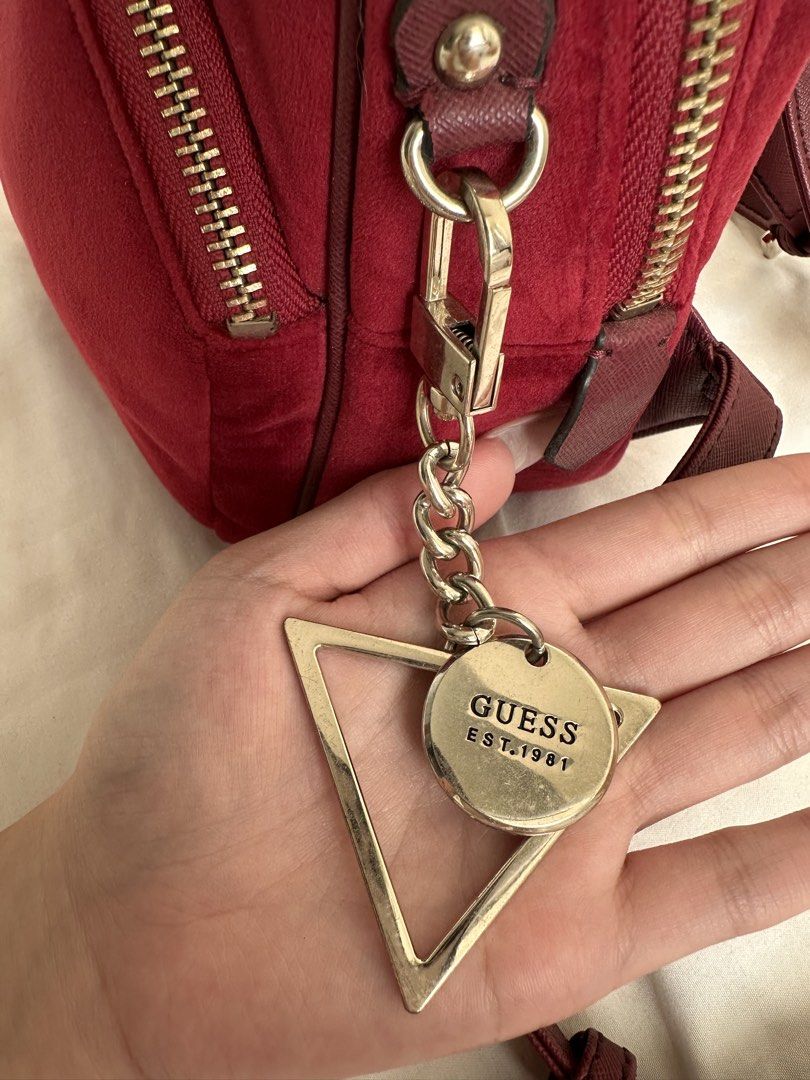 Preloved Guess Red Suede Mini Backpack (Category: Backpacks) located in Manila. Submitted by kaisrmnt (Listing ID 1461894934, Image 2). Description: super cute mini backpack negotiable please note issues: (see pics for reference) slight surface scratches on hardware, slightly tarnished hardware, straps shows signs of wear, with cracking and some chipping/peeling of the outer material, inner lining has some discoloration from use rfs: decluttering