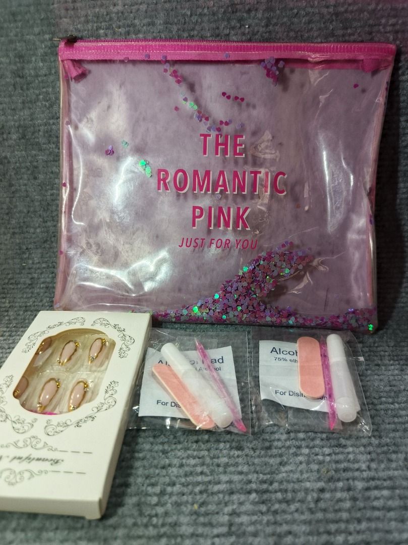 Press-on Nails Kit with Pouch and Tools (Category: Hands & Nails) located in San Leonardo. Submitted by burgossanleonardo.12345 (Listing ID 1461806021, Image 2). Description: - Full set of press-on nails - Comes with a cute pink glitter pouch - Includes nail files - Includes cuticle pushers - Includes alcohol pads - Everything you need for a quick, easy at-home manicure - Perfect for achieving a fresh new look.