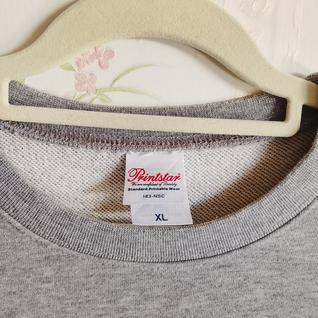 Printstar - Gray Sweater (Category: Coats, Jackets and Outerwear) located in Angeles City. Submitted by sselects_ (Listing ID 1461811530, Image 3). Description: Details of the item: *Color may vary due to lighting Size: XL on tag Width: 23" Length: 28" Sleeves: 26” Issue: small lints only Condition: Excellent ALL ITEMS ARE NEGOTIABLE.