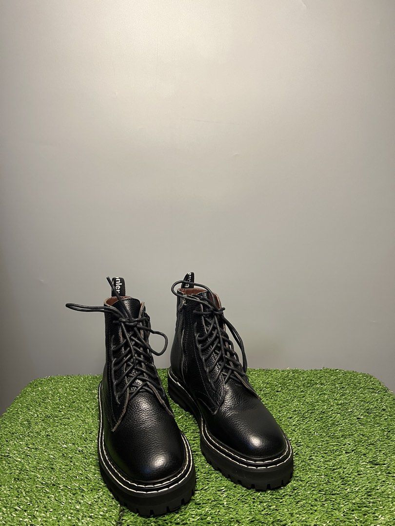 PROENZA SCHOULER - BLACK LUG COMBAT BOOTS (Category: Sneakers & Footwear) located in Bacolod City. Submitted by timelessbyjosh (Listing ID 1461967224, Image 2). Description: BEST FOR CASUAL & AVANT GARDE OUTFITS SIZE : 36 ACTUAL COLOR : BLACK & WHITE COLOR RATE : 10 OUT OF 10 CONDITION : EXCELLENT MATERIAL : MADE IN : ITALY FLAWS : TEAR ON THE SHOELACE AND SIGN OF USAGE ( SEE LAST PHOTO FOR REFERENCE ) “ UNNOTICEABLE & REPLACEABLE “ DIMENSIONS OU