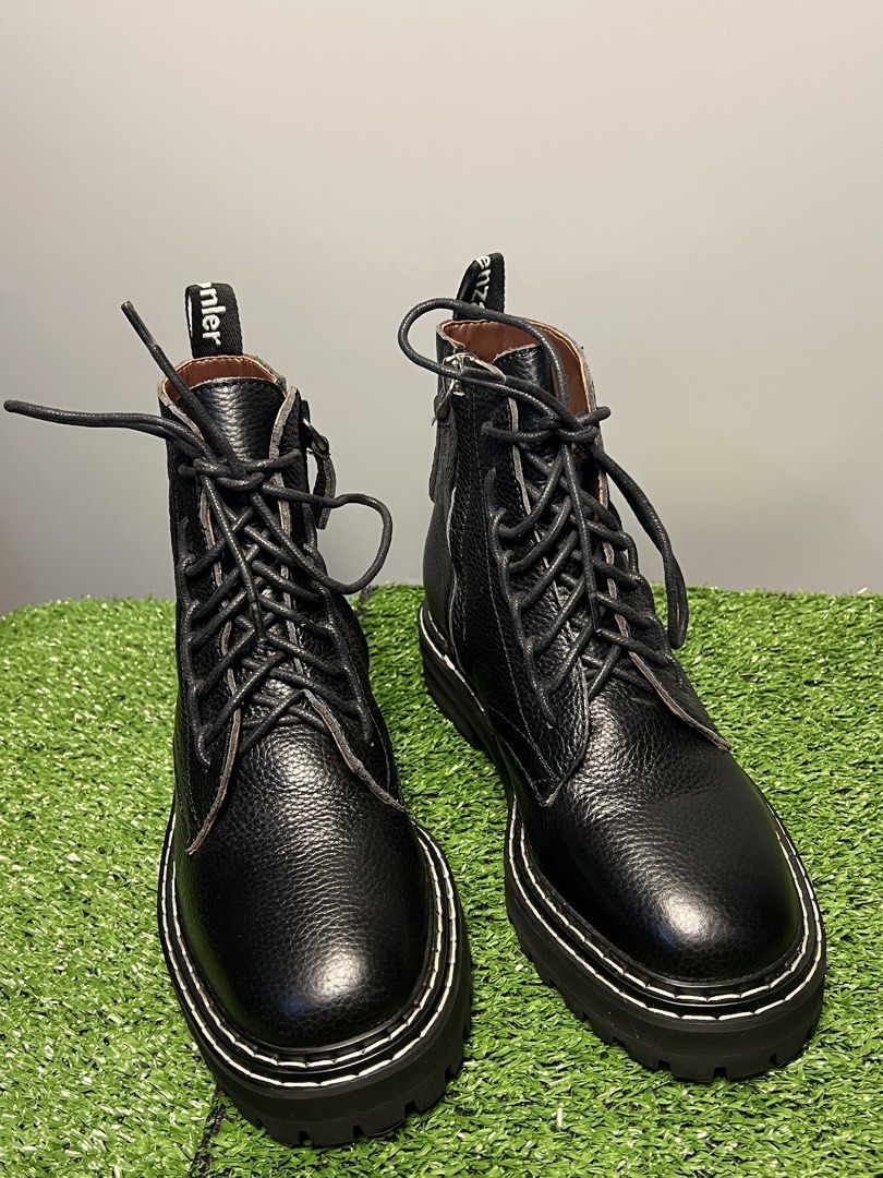 PROENZA SCHOULER - BLACK LUG COMBAT BOOTS (Category: Sneakers & Footwear) located in Bacolod City. Submitted by timelessbyjosh (Listing ID 1461967224, Image 3). Description: BEST FOR CASUAL & AVANT GARDE OUTFITS SIZE : 36 ACTUAL COLOR : BLACK & WHITE COLOR RATE : 10 OUT OF 10 CONDITION : EXCELLENT MATERIAL : MADE IN : ITALY FLAWS : TEAR ON THE SHOELACE AND SIGN OF USAGE ( SEE LAST PHOTO FOR REFERENCE ) “ UNNOTICEABLE & REPLACEABLE “ DIMENSIONS OU