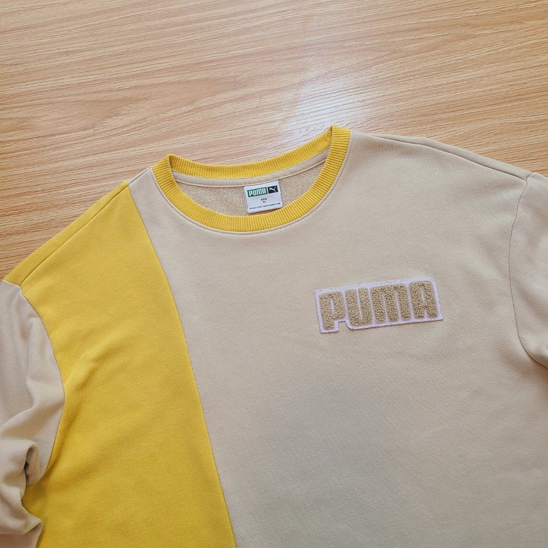 PUMA Mix Badge Long Crew Sweater (Category: Coats, Jackets and Outerwear) located in Quezon City. Submitted by mofinds.ph (Listing ID 1461830092, Image 2). Description: Size: XS Dimes: 21x26 Condition: Excellent/Great condition MOP: BPI DELIVER: LALAMOVE OR J&T MEETUP/PICKUP: Victoria Tower D, Mother Ignacia Ave., Brgy. Paligsahan, Diliman, Quezon City.