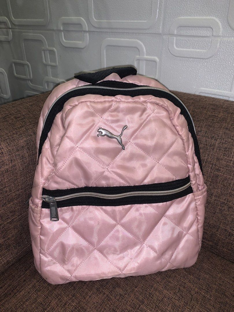 Puma Small Pink Backpack (Category: Backpacks) located in Manila. Submitted by jei_sol (Listing ID 1461908605, Image 1). Description: ORIGINAL PUMA SMALL BACKPACK - pink Puma mini backpack - quilted design - Features a silver Puma logo - Black and silver zippers - Adjustable straps for comfort - Ideal for everyday adventures or travel rfs: declutter.
