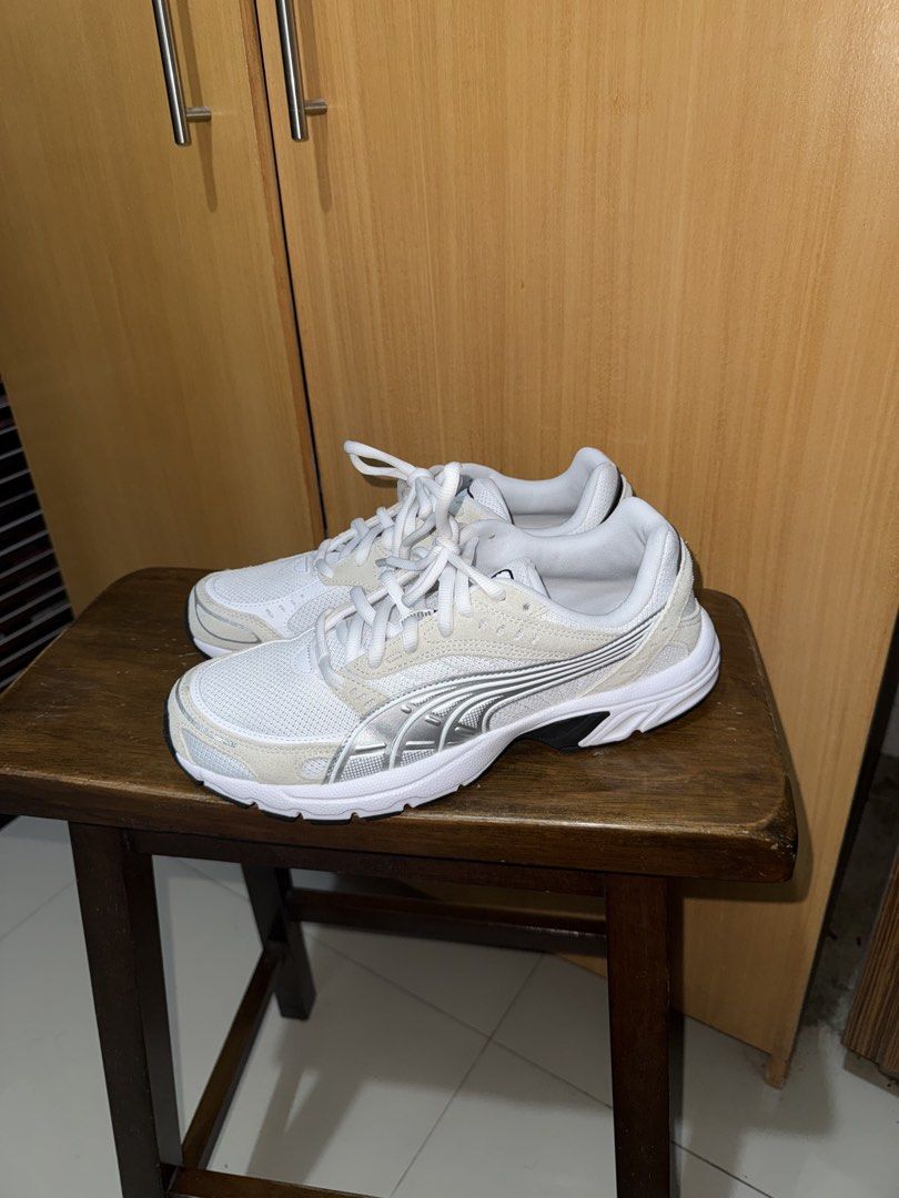 Puma White & Athleisure (Category: Sneakers) located in Manila. Submitted by adrianel6972972 (Listing ID 1461930362, Image 3). Description: - Stylish white and silver Puma sneakers - Versatile: Great for running or casual wear - Unique black and white patterned sole for excellent grip - Comfortable and fashionable design - Classic white laces RS FOR SELLING - Wrong size hahaha.