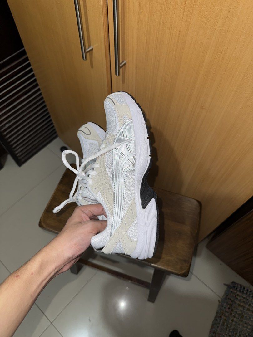 Puma White & Athleisure (Category: Sneakers) located in Manila. Submitted by adrianel6972972 (Listing ID 1461930362, Image 1). Description: - Stylish white and silver Puma sneakers - Versatile: Great for running or casual wear - Unique black and white patterned sole for excellent grip - Comfortable and fashionable design - Classic white laces RS FOR SELLING - Wrong size hahaha.