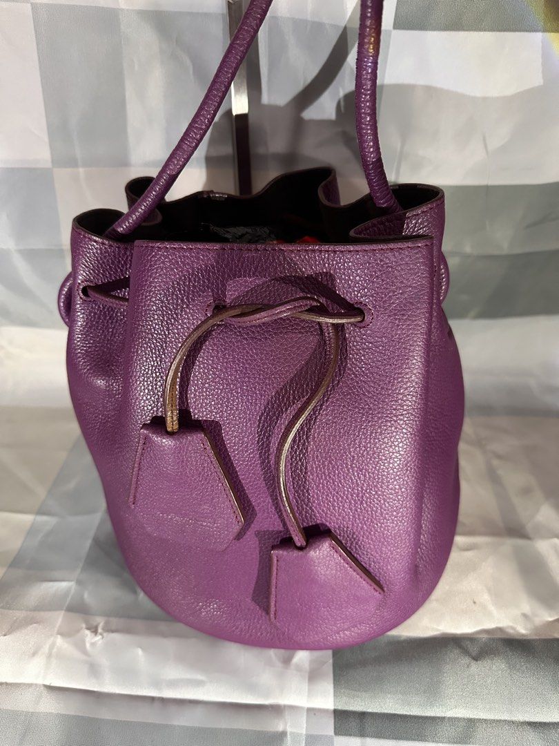 Purple Leather Drawstring Bucket Bag (Category: Cross-body Bags) located in Cavite. Submitted by bags_unltd143 (Listing ID 1461836880, Image 3). Description: Purple leather bucket bag. Drawstring closure. Has two small leather tassels. The base measures 18cm across. The height is 21cm. Great for everyday use..