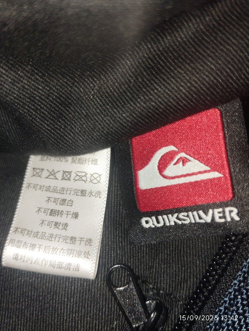 Quiksilver Messenger Bag (Category: Sling Bags) located in Manila. Submitted by thriftjepo01336 (Listing ID 1461887618, Image 3). Description: - Quiksilver messenger bag - Color: Blue with abstract pattern on flap - Features: Main zip compartment, front zip pocket - Adjustable strap for comfortable wear - Ideal for school or everyday use.