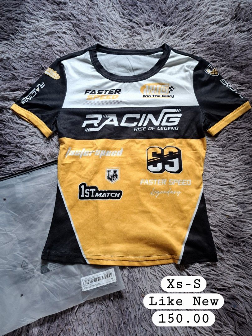 Racing Graphic T-shirt (Category: Tshirts & Polo Shirts ) located in Calamba. Submitted by lnmrzzllch (Listing ID 1461872586, Image 1). Description: - Cool racing graphic tee - Features 'Racing Rise of Legend' and 'Faster Speed' prints - Colorway: Yellow, black, and white - Ideal for casual wear or motorsports fans - Size: XS-S.