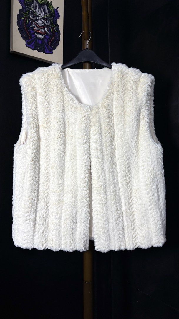 Radarista Fur Vest with Button Closure (Category: Coats, Jackets and Outerwear) located in Bacoor. Submitted by calvinmanzano13 (Listing ID 1461892145, Image 1). Description: - L = 25.5” | W = 23” - Super soft cream faux fur vest - Lined with satin - Two button closures at the front - Ideal for layering in cooler weather - Adds warmth and chic style to any outfit Notes: ☑️ Hand washed ☑️ Polished ☑️ Steam ironed.