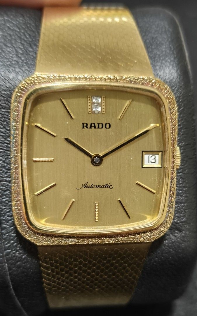 Vintage Rado Automatic Dress Watch (Category: Men's Watches) located in Quezon City. Submitted by jtgabs (Listing ID 1461887628, Image 2). Description: - Vintage Rado watch, 1970s to 1980s - Brushed champagne gold dial -Textured Gold Plate Finishes; integrated mesh style bracelets - Automatic movement - Date window at 3 o'clock - Bezel with small diamonds - "Gangster Style" or "Mafia" Rado - Watch only; "As Is".