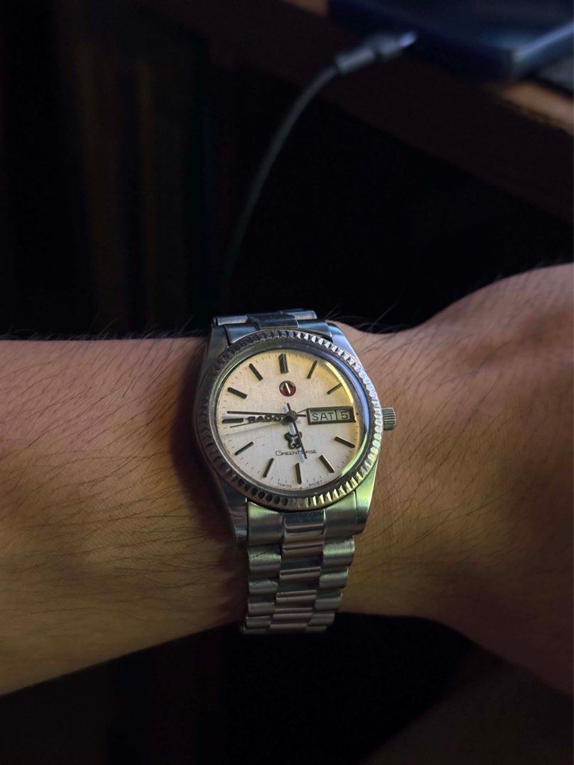 Rado Green Horse (Category: Men's Watches) located in Dasmarinas. Submitted by thepurplehorse (Listing ID 1462012351, Image 2). Description: Vintage Rado Green Horse watch. Automatic movement with day and date complication. Stainless steel case and bracelet. Cream dial with gold fluted bezel. Runs well. A classic piece for your collection..