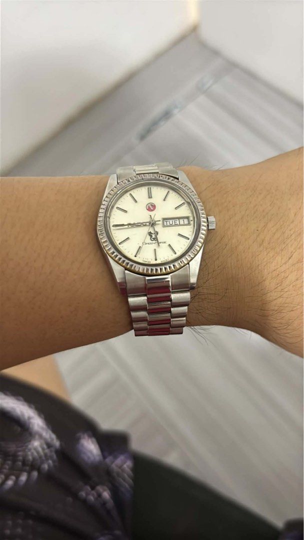 Rado Green Horse (Category: Men's Watches) located in Dasmarinas. Submitted by thepurplehorse (Listing ID 1462012351, Image 3). Description: Vintage Rado Green Horse watch. Automatic movement with day and date complication. Stainless steel case and bracelet. Cream dial with gold fluted bezel. Runs well. A classic piece for your collection..