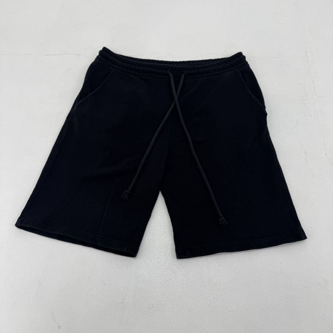 Raf Simons Drylands SS17 Sweatshorts (Category: Luxury Apparel) located in Quezon City. Submitted by johnpaulperezzz (Listing ID 1461896961, Image 1). Description: NAME: Raf Simons Drylands SS17 Sweatshorts COLOR: Black SIZE: Large FIT: 36 Dimension: Waist: 17-20 Inseam: 10 Front Rise: 11 Thigh: 12 Knee: Leg Opening: 10 9 CONDITION: 8.5/10 ISSUE: -crack print at the logo PRICE: 5k .