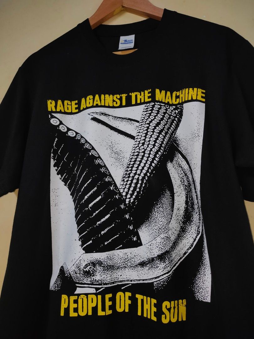 Rage Against The Machine (Category: Tshirts & Polo Shirts ) located in Cebu City. Submitted by richardvbaesa (Listing ID 1461841411, Image 3). Description: - Rage Against The Machine 'People Of The Sun' T-Shirt - Color: Black - Size: Large - Front Graphic: 'People Of The Sun' design - Back Graphic: Band performing live with lyrics - Ideal for RATM fans and collectors.