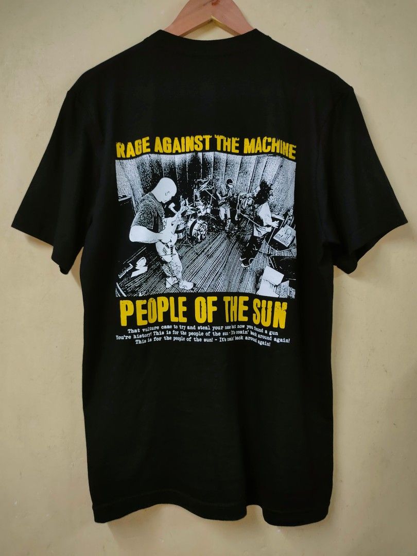 Rage Against The Machine (Category: Tshirts & Polo Shirts ) located in Cebu City. Submitted by richardvbaesa (Listing ID 1461841411, Image 2). Description: - Rage Against The Machine 'People Of The Sun' T-Shirt - Color: Black - Size: Large - Front Graphic: 'People Of The Sun' design - Back Graphic: Band performing live with lyrics - Ideal for RATM fans and collectors.