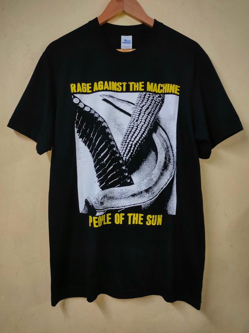 Rage Against The Machine (Category: Tshirts & Polo Shirts ) located in Cebu City. Submitted by richardvbaesa (Listing ID 1461841411, Image 1). Description: - Rage Against The Machine 'People Of The Sun' T-Shirt - Color: Black - Size: Large - Front Graphic: 'People Of The Sun' design - Back Graphic: Band performing live with lyrics - Ideal for RATM fans and collectors.