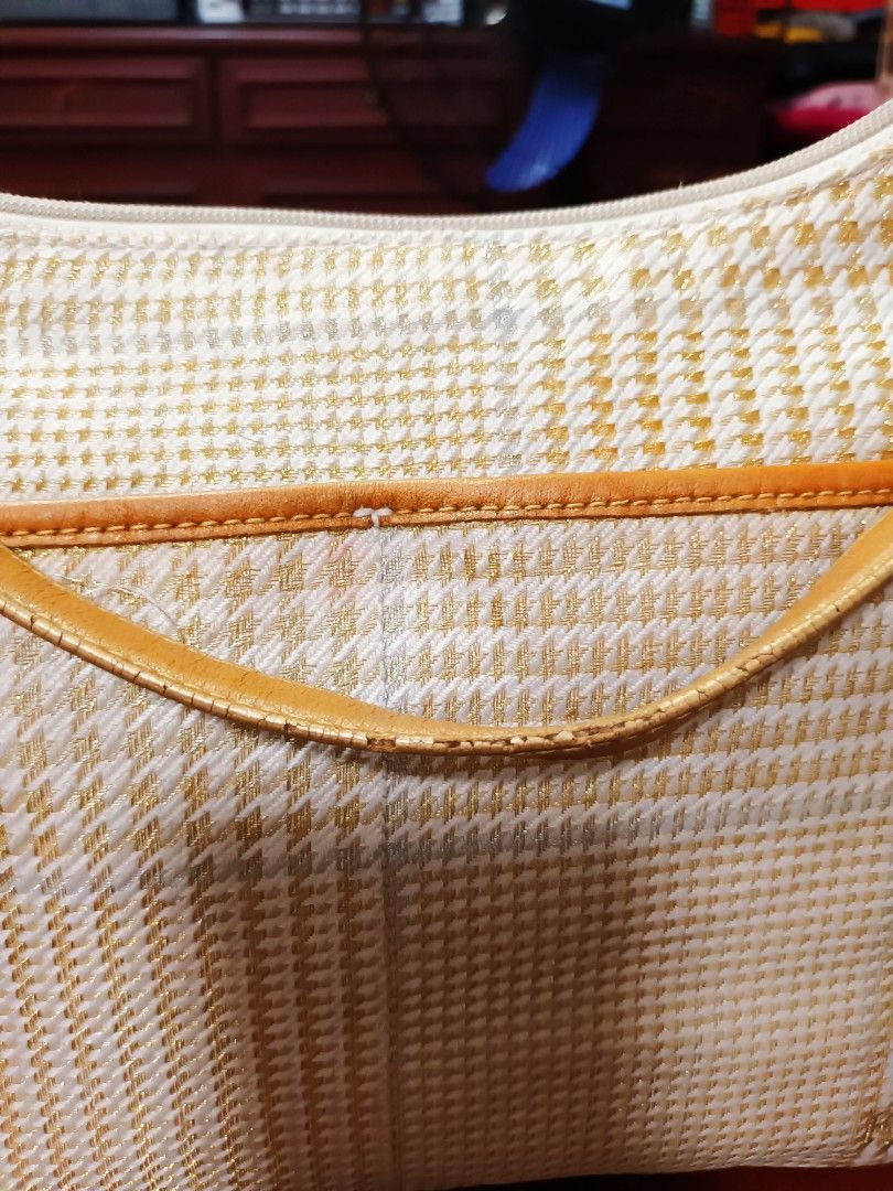 Ralph Lauren Plaid Shoulder Bag (Category: Shoulder Bags) located in Manila. Submitted by berryrare58 (Listing ID 1461805299, Image 3). Description: Classic bag by Lauren Ralph Lauren Tan leather trim &straps Zipper closure With minor wear please take a look at all the photos detail W12" D 4" H 8.5".