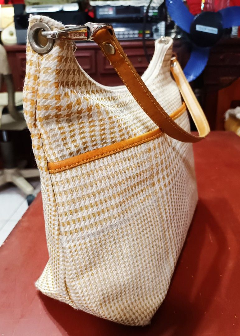 Ralph Lauren Plaid Shoulder Bag (Category: Shoulder Bags) located in Manila. Submitted by berryrare58 (Listing ID 1461805299, Image 2). Description: Classic bag by Lauren Ralph Lauren Tan leather trim &straps Zipper closure With minor wear please take a look at all the photos detail W12" D 4" H 8.5".