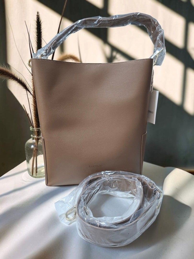 RANDEBOO 2WAY LEATHER BUCKET BAG (Category: Tote Bags) located in Las Pinas. Submitted by annachiaonair2037 (Listing ID 1461865277, Image 3). Description: RANDEBOO 2WAY LEATHER BUCKET BAG FROM JAPAN GRAIGE COLOR (GRAY BEIGE) BOTH STRAPS DETACHABLE LONGER STRAP ADJUSTABLE RETAILS AT ¥16K BRAND NEW H 13.5" L 11" W 4" Disclaimer: I am not affiliated with, associated with, or authorized by any of the brands featured posted. Any mention of brand names