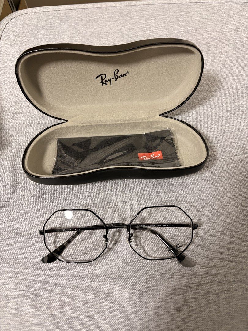 Ray-Ban Eyeglasses (Category: Sunglasses & Eyewear) located in Manila. Submitted by choru07 (Listing ID 1461973647, Image 1). Description: - Authentic Ray-Ban Octagon Eyeglasses (Model RB 1972V) - Stylish Black Frame with Unique Octagon Shape - Includes Original Ray-Ban Case and Cleaning Cloth - Lens Size: 54mm - Bridge Width: 19mm - Temple Length: 145mm - Ideal for Everyday Wear.