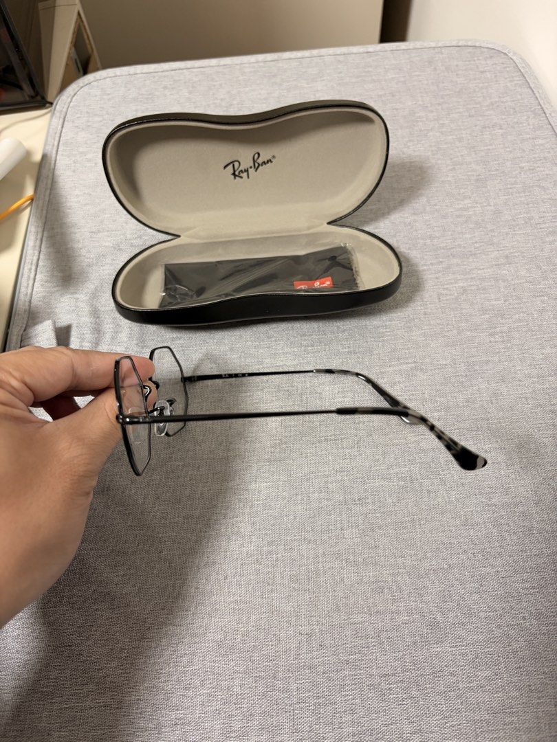 Ray-Ban Eyeglasses (Category: Sunglasses & Eyewear) located in Manila. Submitted by choru07 (Listing ID 1461973647, Image 2). Description: - Authentic Ray-Ban Octagon Eyeglasses (Model RB 1972V) - Stylish Black Frame with Unique Octagon Shape - Includes Original Ray-Ban Case and Cleaning Cloth - Lens Size: 54mm - Bridge Width: 19mm - Temple Length: 145mm - Ideal for Everyday Wear.