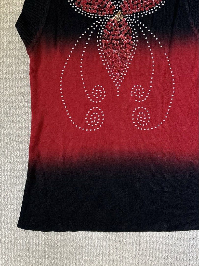 Red Graphic w/ rhinestone top (Category: Others Tops) located in Quezon City. Submitted by y2klar (Listing ID 1461957013, Image 3). Description: Red Graphic w/rhinestone top Size-Small-Medium L-24 10/10 Condition no flaws..