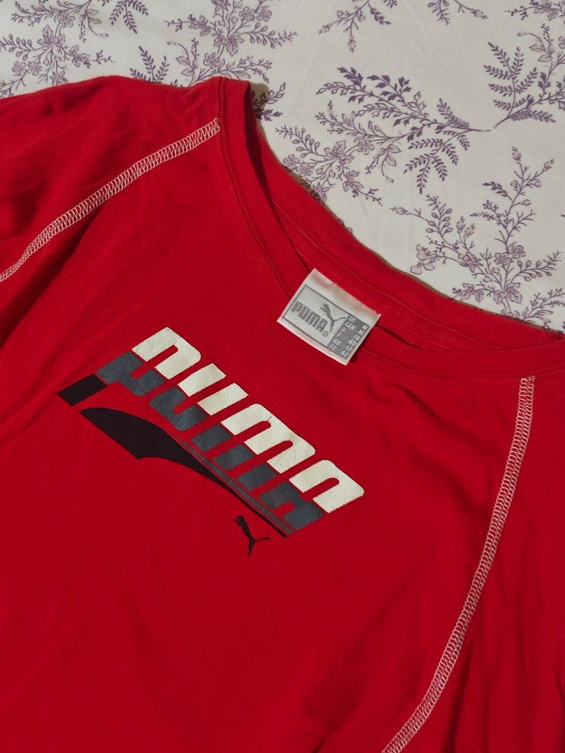 red long-sleeve Puma athletic shirt (Category: Tshirts & Polo Shirts ) located in Bulacan. Submitted by angel.decluttersx (Listing ID 1461979846, Image 2). Description: medium size on white tag orig cotton fabric material no cracks sa print no issue.