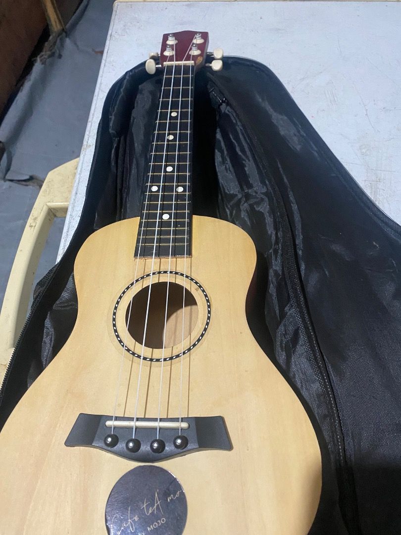 Red Ukulele with Gig Bag (Category: Musical Instruments) located in Caloocan City. Submitted by sophiamay.2004 (Listing ID 1462021080, Image 1). Description: - Red ukulele with natural wood top - Ideal for beginners or learning - Comes with a black gig bag - had some little scratch near tuners.