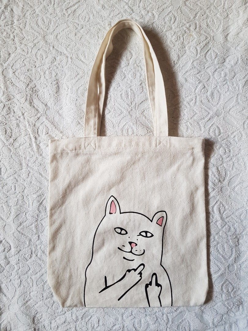 Rip N Dip Tote Bag (Category: Tote Bags) located in Santo Domingo. Submitted by jcobedoza213916 (Listing ID 1461817269, Image 1). Description: Rip N Dip Tote Bag Women's width 13 lenght 14 working zipper under zip 7 good condition color rate 9.5/10 no issue: no pinhole no flaws no discoloration.