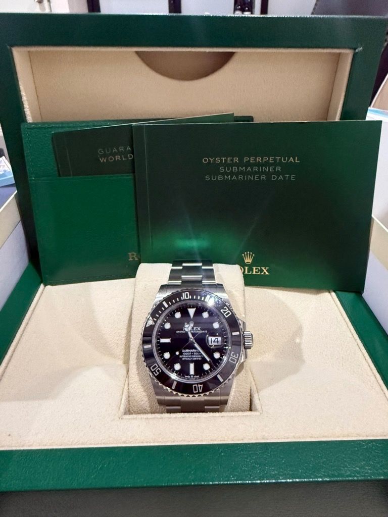 Rolex Submariner Date Watch (Category: Luxury Watches) located in Manila. Submitted by atty.jay (Listing ID 1461924352, Image 1). Description: - Rolex Submariner Date Reference: 126610LN Size: 41mm (Modern tapered case profile) Warranty Card: Matching original Rolex warranty card officially dated May 27, 2021.