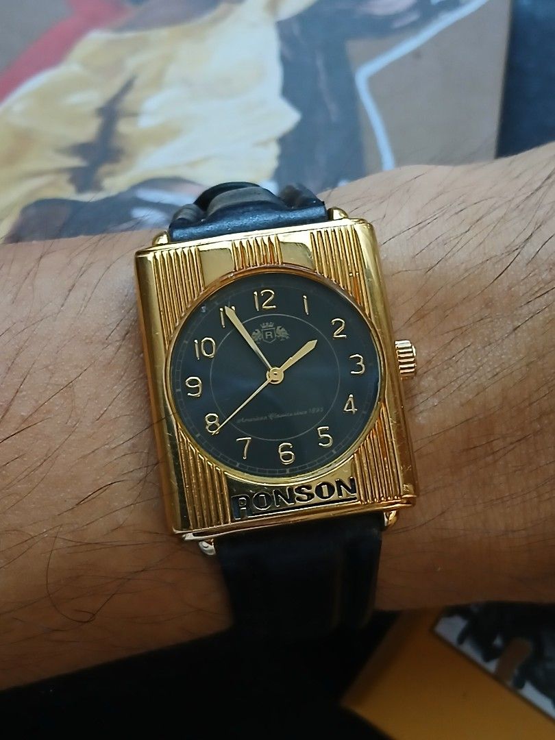 RONSON Tank, Quartz (Category: Luxury Watches) located in Tabaco. Submitted by igoys-watches (Listing ID 1461851014, Image 1). Description: RONSON Tank, Quartz (UNISEX) ✅️Good Running Condition ✅️All Original Head ✅️Gold Tone in Great Condition ✅️Ribbed Tank Case ✅️Black Sunburst Dial ✅️MIYOTA Movement ✅️Original Buckle ✅️Neo-Vintage Dress Watch, 1985 ✅️Rare and Discontinued 🔍 ✅️"OLD MONEY VIBES" ✅️"Art Deco" Inspired Design ✅️Perfect for Formal