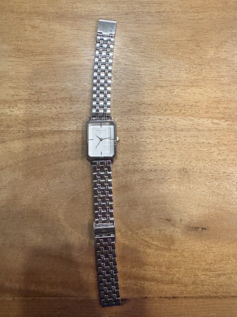 Rosefield Watch Silver Rectangle Face (Category: Women's Watches) located in Carmen. Submitted by t1torref (Listing ID 1461903408, Image 2). Description: - Rosefield silver watch - Rectangular face with a clean white dial - Metal link strap - Simple and classic design - Perfect for everyday wear or dressing up - Works well.