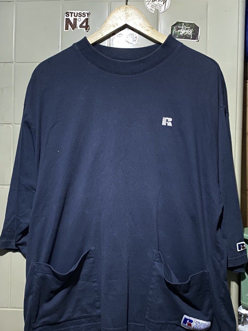 Russel Athletic Crew Neck With Dual Pockets (SIZE LARGE) (Category: Tshirts & Polo Shirts ) located in Manila. Submitted by brothersarchive (Listing ID 1461973339, Image 1). Description: Up for sale is a unique and rare navy blue Russell Athletic long-sleeve crewneck shirt. This piece stands out from typical sportswear with its distinctive dual utility front pockets at the waist, combining functional streetwear style with classic comfort..