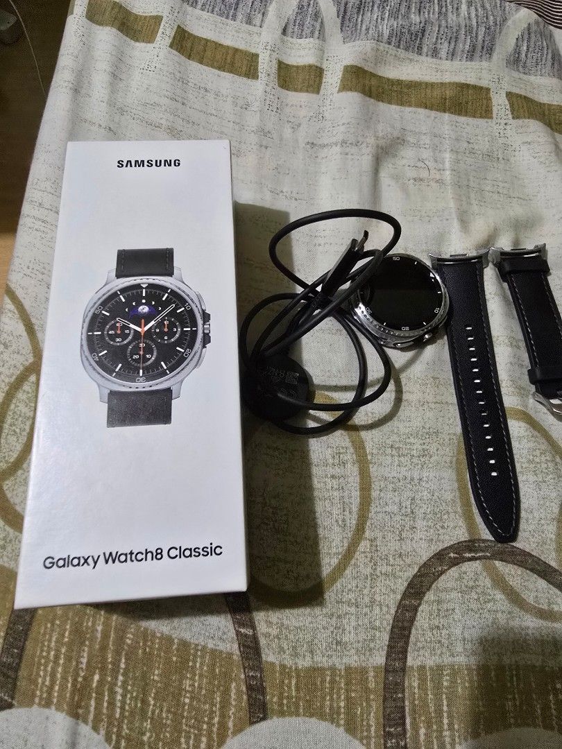Samsung Galaxy Watch 8 Classic Smartwatch (Category: Wearables & Smart Watches) located in Quezon City. Submitted by kyotow (Listing ID 1462023729, Image 1). Description: - Samsung Galaxy Watch 8 Classic - Comes with original box and charger - Features a stylish black leather strap - Ideal for fitness tracking and receiving daily notifications - Bright and clear display - Customizable watch faces - RFS: Upgrade - Still under warranty -MOP Cash/Ba