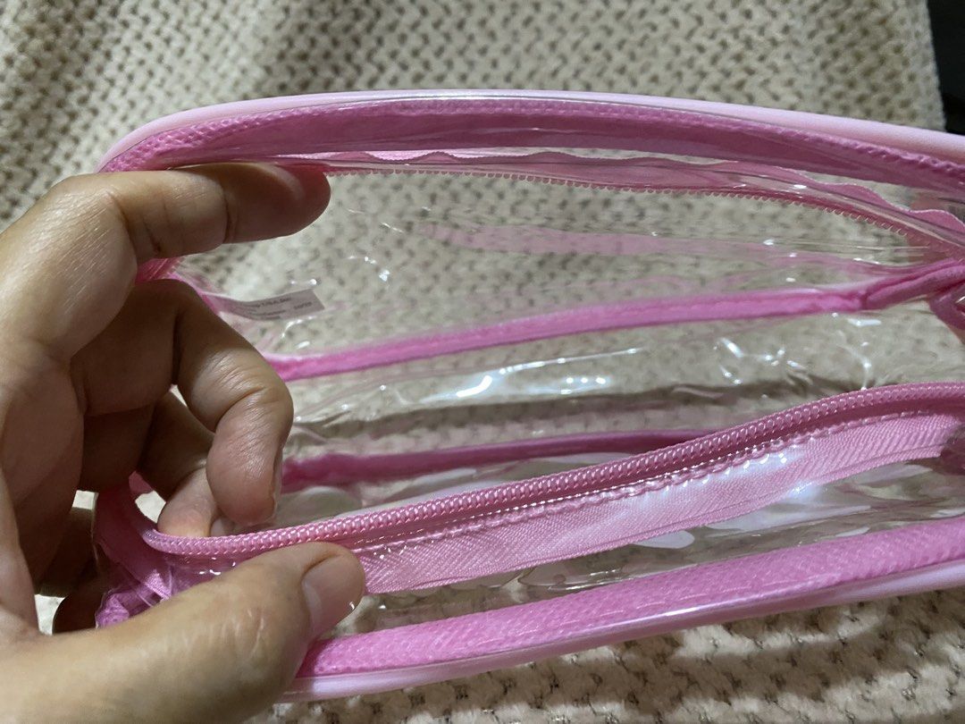 Sanrio “Happy Spring!” clear pink pencil pouch (Category: Purses & Pouches) located in Cavite. Submitted by momrocks (Listing ID 1461820709, Image 3). Description: Sanrio “Happy Spring!” clear pink pencil pouch featuring Hello Kitty, My Melody, and Kuromi wearing bunny ears Product DetailsDesign: A clear vinyl pouch with a bright pink zipper border and the words “Happy Spring!” printed across the top. Characters: Die-cut or printed inserts show H