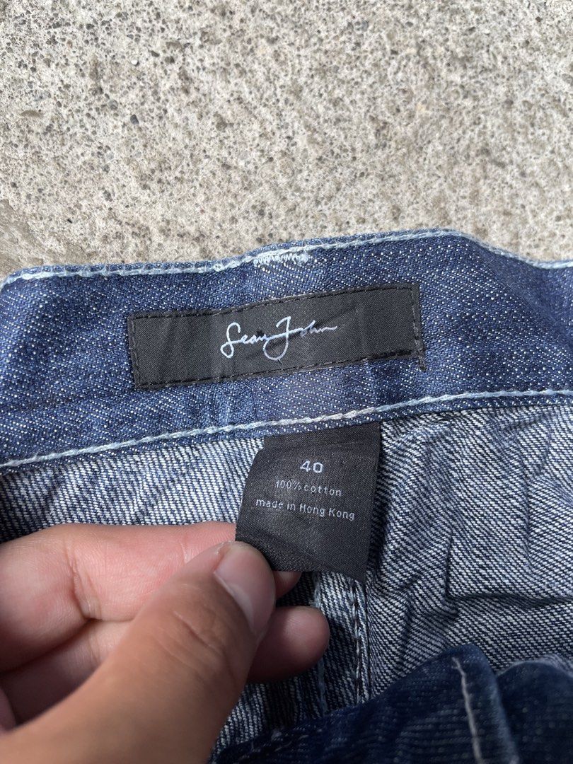 Sean John Denim Shorts Size 40 (Category: Shorts) located in Siniloan. Submitted by rethr1ft (Listing ID 1461842779, Image 3). Description: - 40 waist / 29 length / 12.5 hem - Brand: Sean John - Size: 40 - Material: 100% Cotton - Color: Classic Blue Wash with White Stitching - Features: Embroidered Sean John logo on back pocket - Origin: Made in Hong Kong - Style: Great for casual wear.