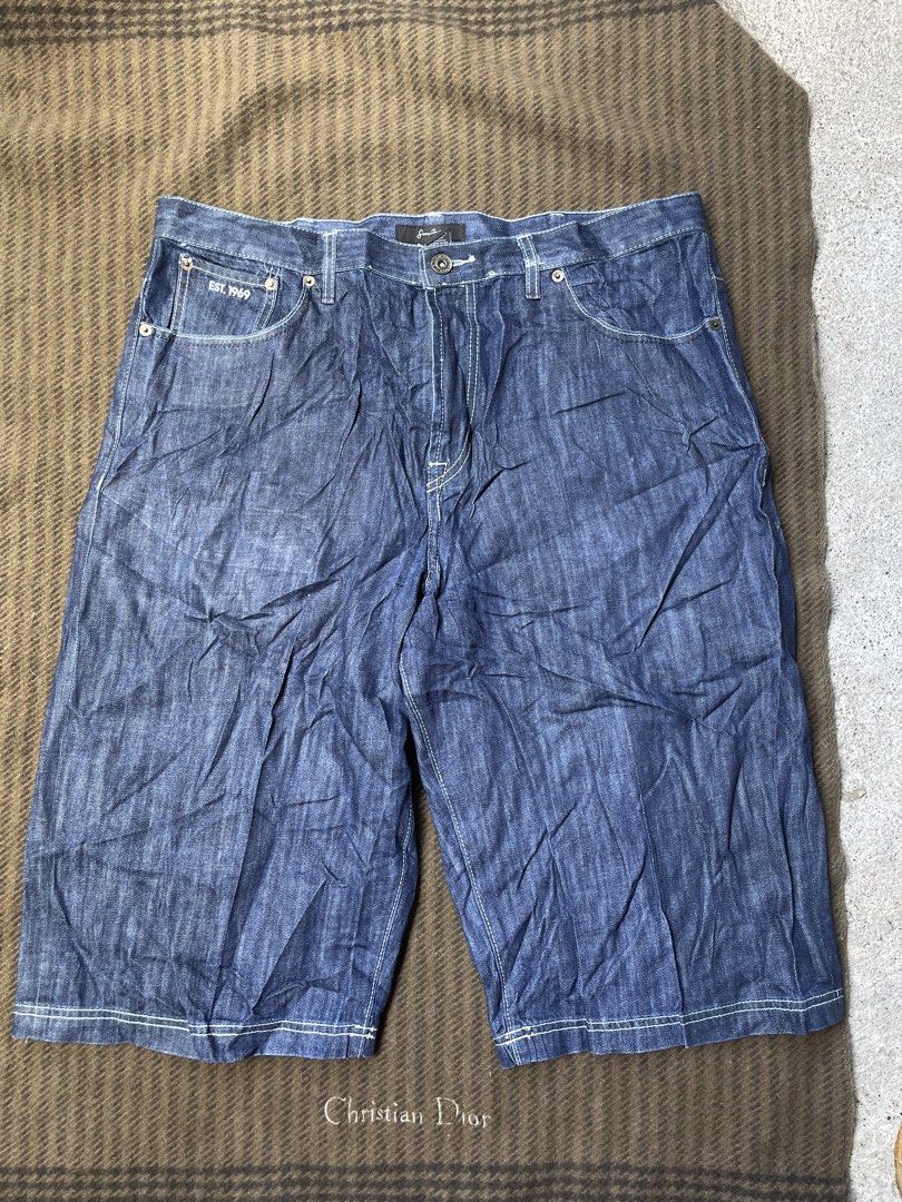 Sean John Denim Shorts Size 40 (Category: Shorts) located in Siniloan. Submitted by rethr1ft (Listing ID 1461842779, Image 2). Description: - 40 waist / 29 length / 12.5 hem - Brand: Sean John - Size: 40 - Material: 100% Cotton - Color: Classic Blue Wash with White Stitching - Features: Embroidered Sean John logo on back pocket - Origin: Made in Hong Kong - Style: Great for casual wear.