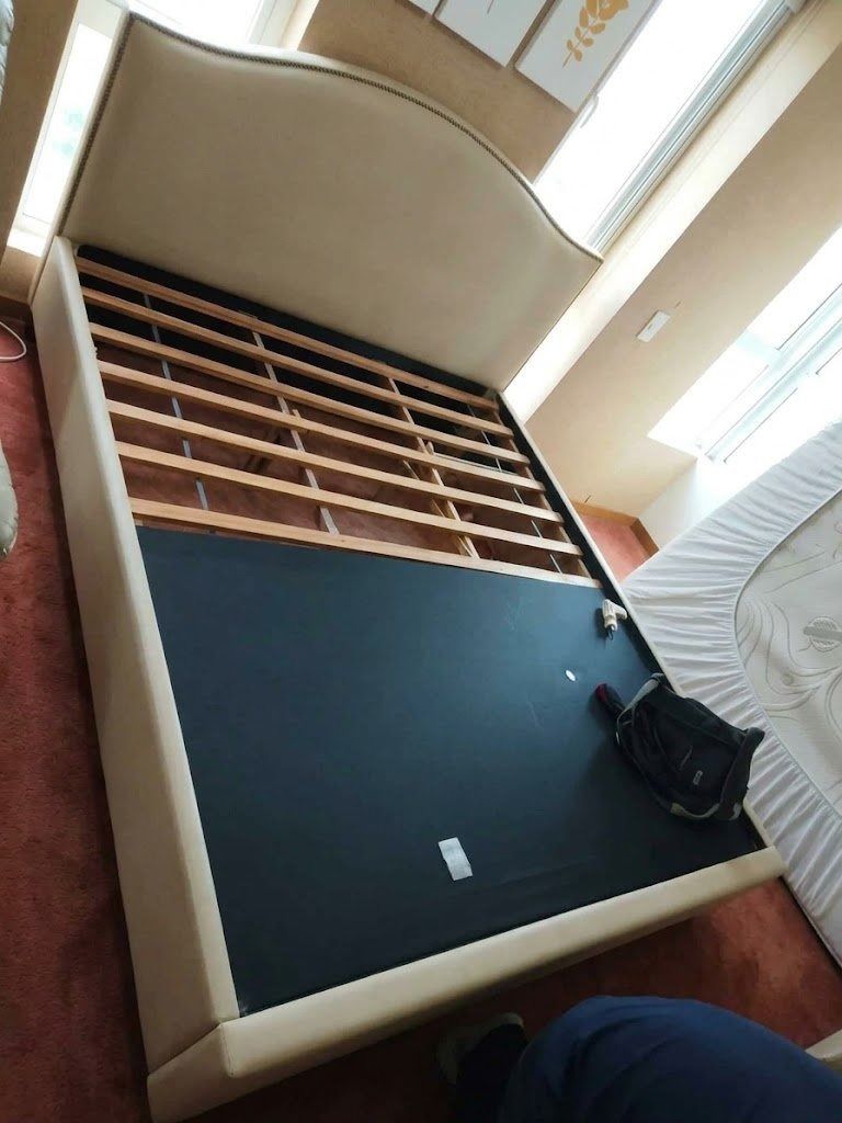 Second Hand King Size Bed Frame (Category: Bed Frames & Mattresses) located in Makati City. Submitted by cityscape_properties (Listing ID 1461821050, Image 1). Description: Well used King size Bed Frame Mid Range Upholstered Standard Padded Frames Solid Wood With Yellow Stain on the upper left of the head board. (May use leather cleaner/ solution) The frame has been dis assembled and ready for pick up. Open to personally check the item. .