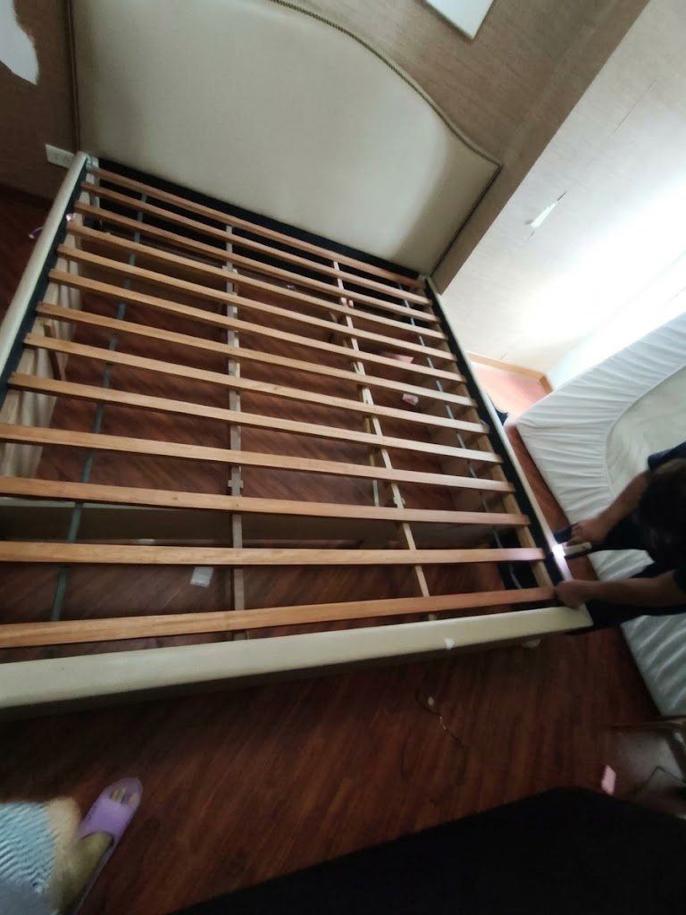 Second Hand King Size Bed Frame (Category: Bed Frames & Mattresses) located in Makati City. Submitted by cityscape_properties (Listing ID 1461821050, Image 2). Description: Well used King size Bed Frame Mid Range Upholstered Standard Padded Frames Solid Wood With Yellow Stain on the upper left of the head board. (May use leather cleaner/ solution) The frame has been dis assembled and ready for pick up. Open to personally check the item. .