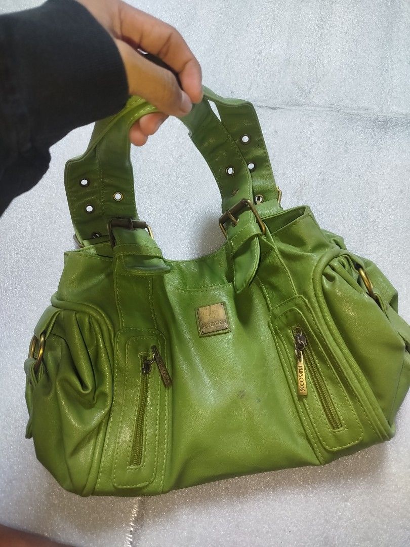 Secosana Green Leather Shoulder Bag (Category: Shoulder Bags) located in Manila. Submitted by jemsthrift (Listing ID 1461814219, Image 1). Description: - Bright green Secosana shoulder bag - Made of faux leather - Multiple zippered pockets on the front - Side pockets - Gold hardware details - Adjustable straps - Great for everyday use - Minor marks on leather (please check photos).