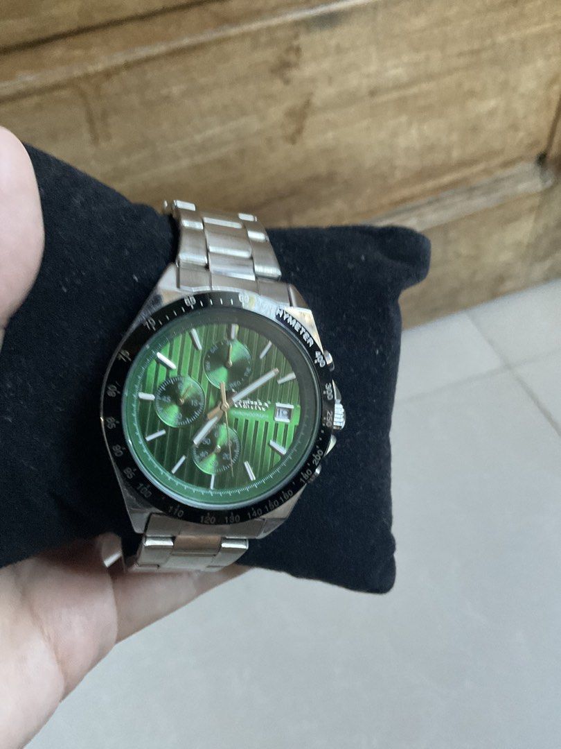 Seiko Inspired Chronograph Watch (Replica) (Category: Wearables & Smart Watches) located in Cabanatuan. Submitted by dindin_7 (Listing ID 1462029321, Image 2). Description: For Sale: Seiko Inspired Chronograph Watch (Replica) Brand / Style: Seiko Inspired Chronograph (High-Grade Copy / Replica) Dial Color: Textured Emerald Green with Tachymeter Bezel Strap Material: Stainless Steel Bracelet Condition: Excellent condition / Like new, comes with wa