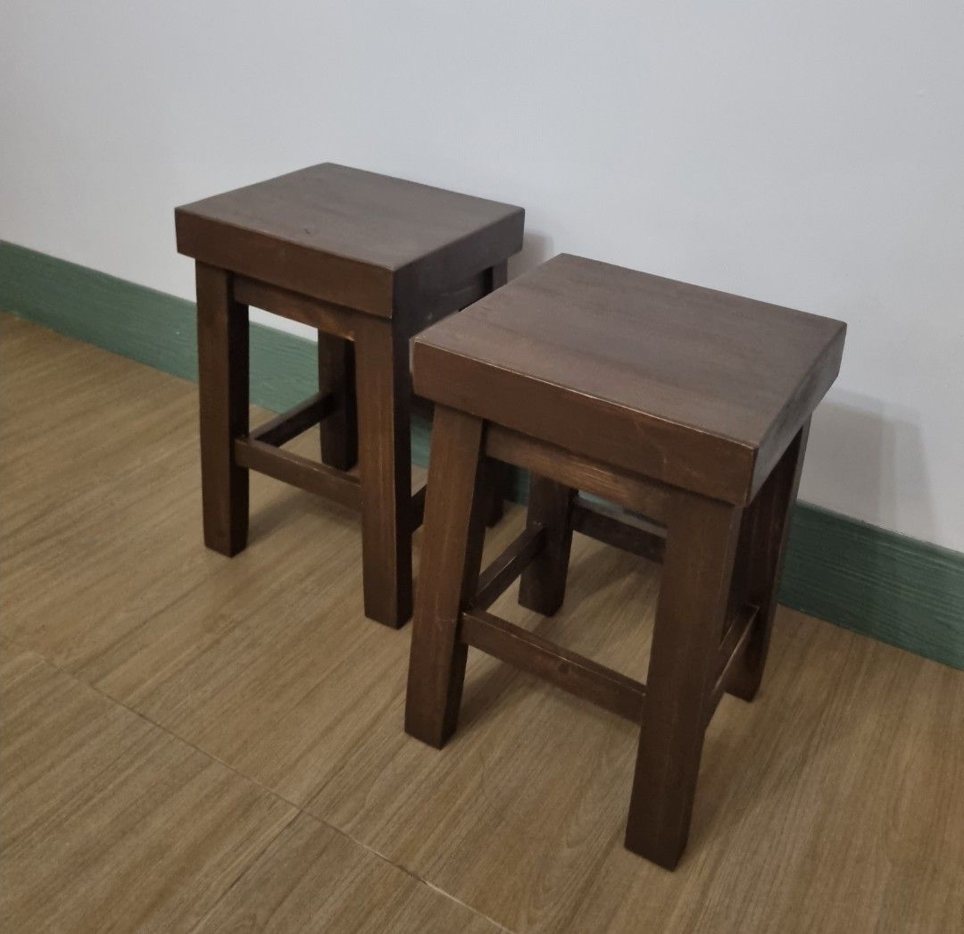 Set of 2 Wooden Stools (Category: Chairs) located in Quezon City. Submitted by rusticwood8 (Listing ID 1461812375, Image 2). Description: - Set of 2 wooden stools - Rich dark brown color - Sturdy solid wood construction - Ideal for extra seating or as a footrest - Compact and easy to move - Suitable for any room in your home.