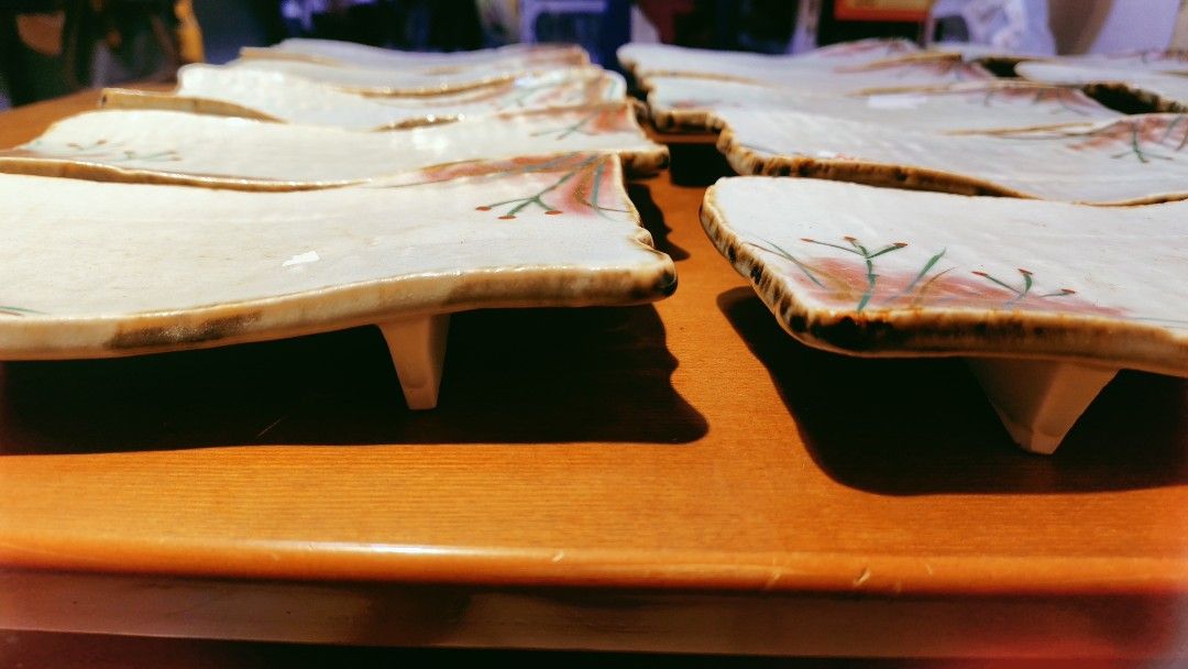 Set of Rectangular Ceramic Plates with Floral Design (Category: Dinnerware & Cutlery) located in Bulacan. Submitted by babz30261 (Listing ID 1461989317, Image 3). Description: - Set of unique rectangular ceramic plates - White base with delicate red and green floral design - Rustic, glazed wavy edges - Ideal for serving appetizers, sushi, or small dishes.